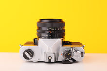 Load image into Gallery viewer, Fujica STX-1 35mm SLR Film Camera with X-Fujinon 55mm F 2.2 Lens