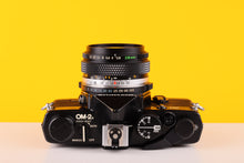 Load image into Gallery viewer, Olympus OM-2n MD Black 35mm Film Camera with Zuiko 28mm f/2.8 Lens
