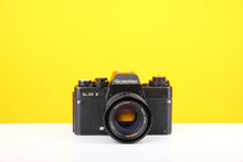 Load image into Gallery viewer, Rolleiflex SL35 E 35mm Film Camera with Rollei Planar 50mm f1.8 Lens