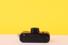 Load image into Gallery viewer, Pentax Auto 110 SLR Film Camera + 24mm f/2.8 Lens