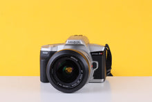 Load image into Gallery viewer, Minolta Dynax 3L 35mm Film Camera with Minolta 28-100mm f/3.5 - 5.6 Zoom Lens