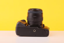 Load image into Gallery viewer, Canon EOS 850 35mm Autofocus SLR Film Camera with Sigma 35–80mm Zoom Lens