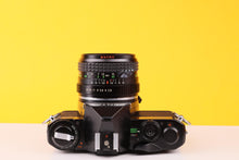 Load image into Gallery viewer, Asahi Pentax MV 35mm SLR Film Camera with Super Paragon PMC II 28mm f/2.8 Lens