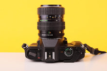 Load image into Gallery viewer, Pentax P30 35mm SLR Film Camera with SMC Pentax-M 28–50mm f/3.5–4.5 Zoom Lens