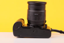 Load image into Gallery viewer, Canon EOS 1000F N 35mm Film SLR Camera with Sigma 28-105mm Zoom Lens