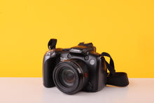 Load image into Gallery viewer, Canon PowerShot SX10 IS 10MP Digital Bridge Camera 20x Optical Zoom