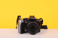 Load image into Gallery viewer, Canon PowerShot SX10 IS 10MP Digital Bridge Camera 20x Optical Zoom