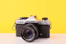 Load image into Gallery viewer, Fujica ST605 35mm SLR Film Camera with Fujinon 55mm f/2.2 Lens
