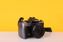 Load image into Gallery viewer, Canon PowerShot SX10 IS 10MP Digital Bridge Camera 20x Optical Zoom