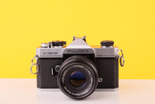 Load image into Gallery viewer, Fujica ST605 35mm SLR Film Camera with Fujinon 55mm f/2.2 Lens