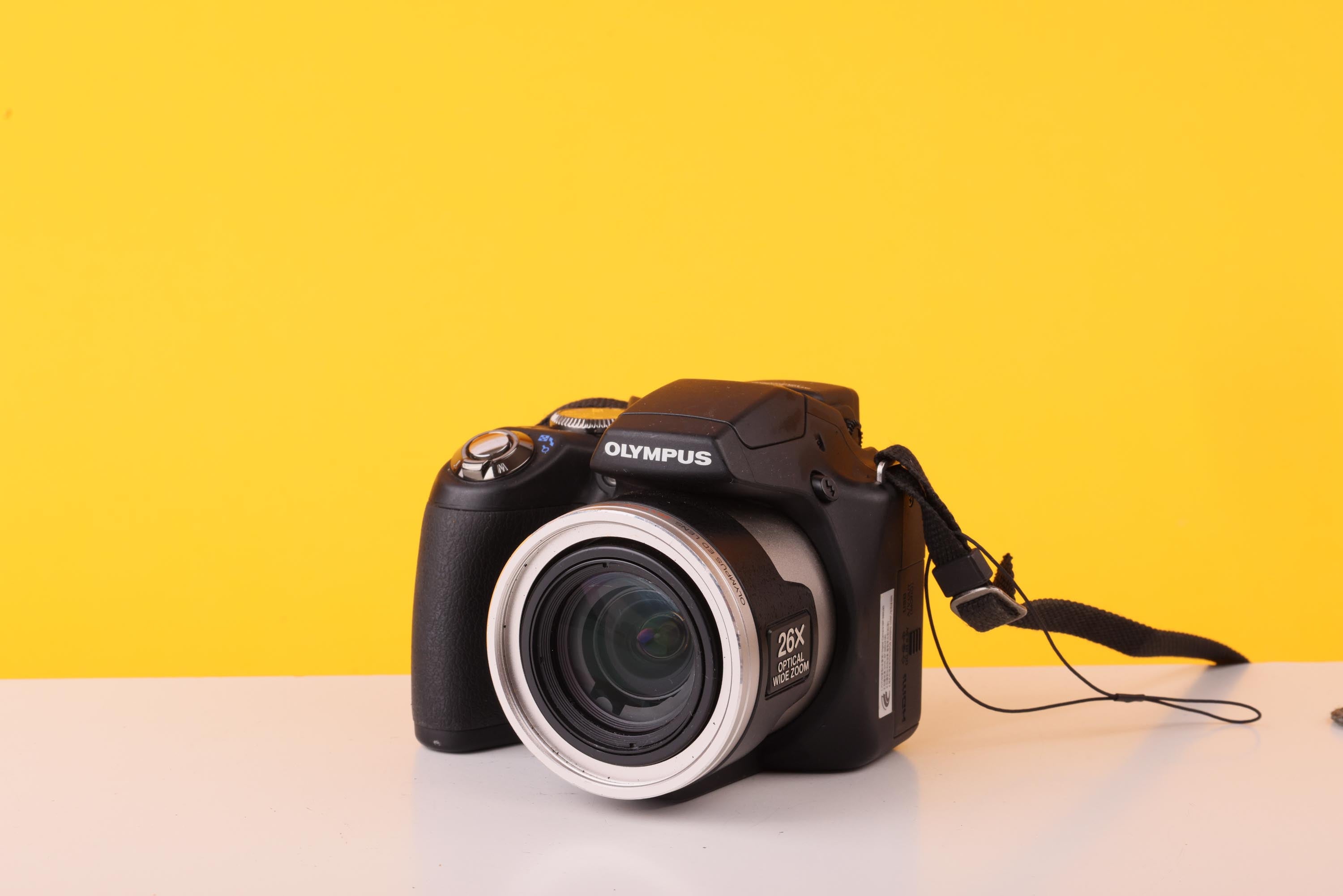 Olympus SP-590UZ 12MP Compact Digital Camera 26x Optical Zoom
