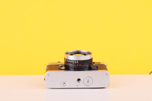 Load image into Gallery viewer, Minolta Hi-Matic 7sII 35mm Rangefinder Film Camera with 40mm f/1.7 Rokkor Lens & Case