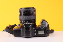 Load image into Gallery viewer, Minolta Dynax 3000i 35mm SLR Film Camera with 35–105mm AF Zoom Lens