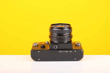 Load image into Gallery viewer, Zenit 11 35mm SLR Film Camera with Tokina RMC 28mm f2.8 Lens
