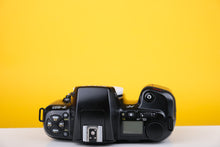 Load image into Gallery viewer, Nikon F-601 35mm SLR Film Camera Body Only