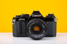 Load image into Gallery viewer, Canon AV-1 35mm 35mm Film Camera SLR with 50mm f2 Lens