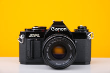 Load image into Gallery viewer, Canon AV-1 35mm Film SLR with 50mm f2 Lens