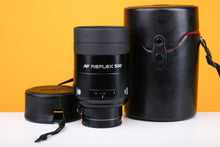 Load image into Gallery viewer, Minolta AF Reflex 500mm f/8 Lens with Case

