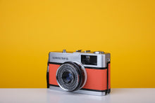Load image into Gallery viewer, Olympus Trip 35 Vintage 35mm Film Camera with Zuiko 40mm f2.8 Lens and New Orange Leather Skin
