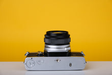 Load image into Gallery viewer, Olympus OM-1n 35mm SLR Film Camera with Zuiko 28mm f2.8 Lens