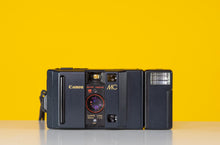 Load image into Gallery viewer, Canon MC 35mm Film Camera Point and Shoot with Case