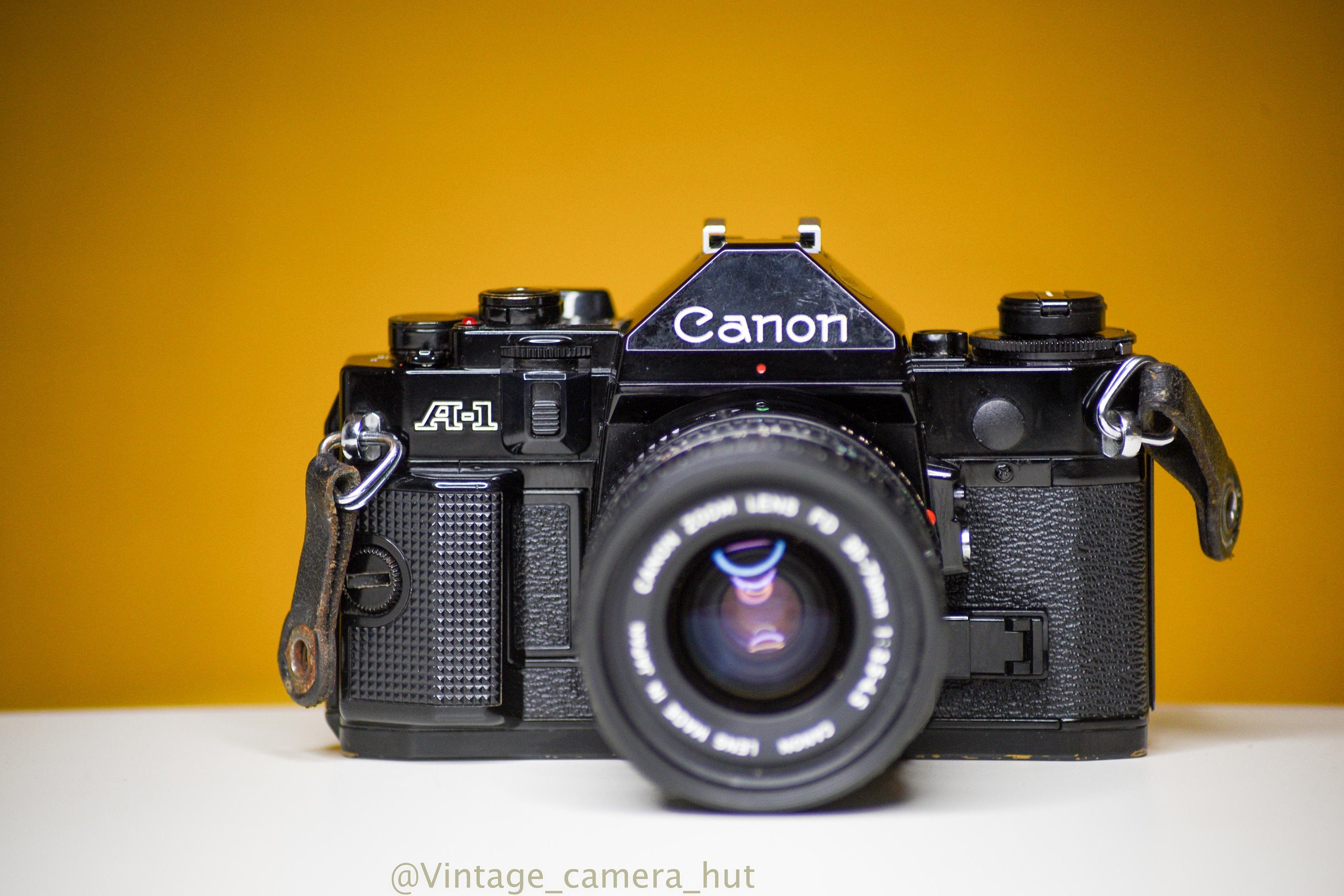 Canon A-1 Vintage 35mm Film Camera with Canon Zoom Lens FD 35-70mm f/3.5  with Lens Filter Cap