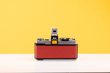 Load image into Gallery viewer, Olympus OM-1 35mm SLR Film Camera with Olympus OM-System G.Zuiko Auto-S 50mm f1.4 Lens in Red
