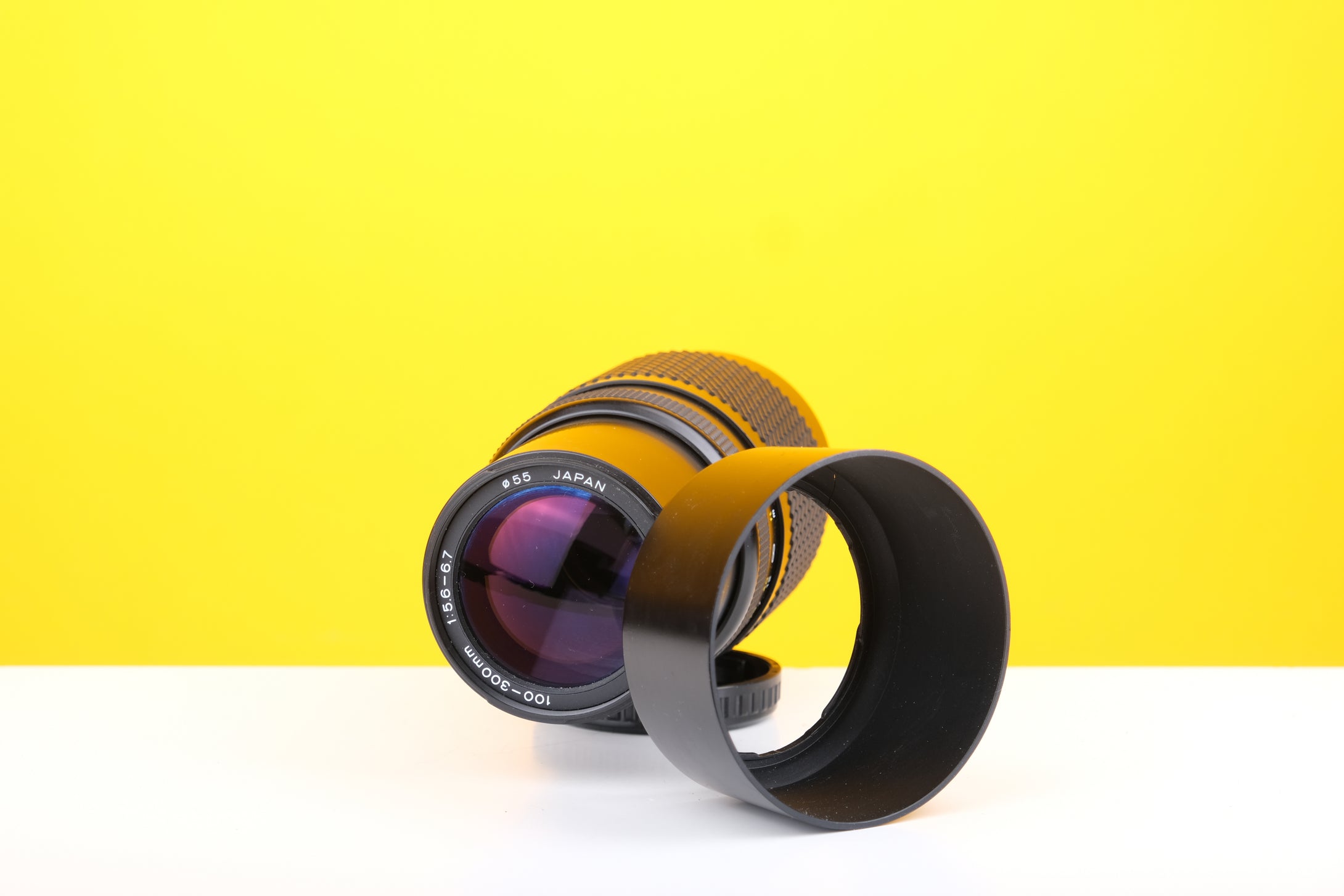 Tokina AF 100-300mm f5.6-6.7 Macro Telephoto Lens with Lens Hood EF Mount