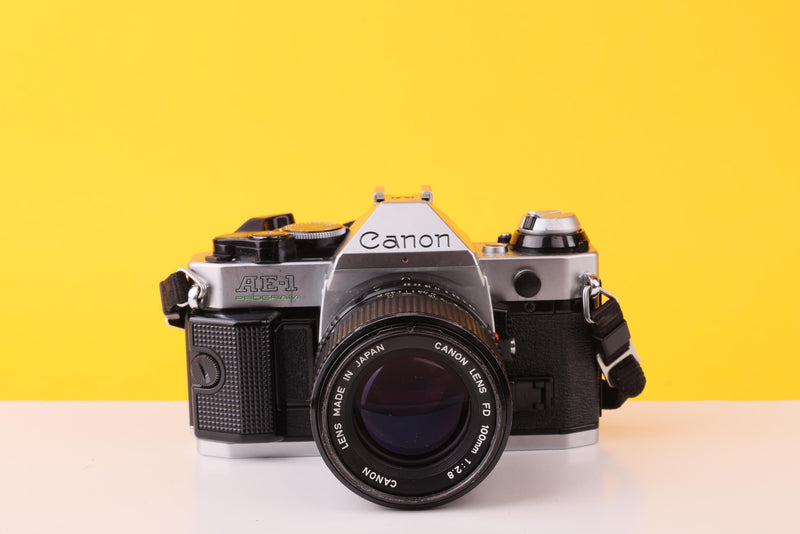Canon AE-1 Program 35mm Film SLR Camera with Canon FD 100mm f/2.8 Lens