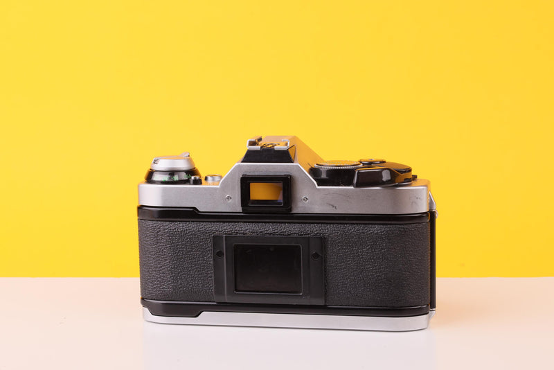 Canon AE-1 Program 35mm Film SLR Camera with Canon FD 100mm f/2.8 Lens
