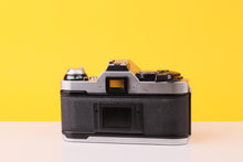 Load image into Gallery viewer, Canon AE-1 Program 35mm Film SLR Camera with Canon FD 100mm f/2.8 Lens
