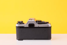 Load image into Gallery viewer, Olympus OM10 35mm Film SLR Camera with Sigma 70–210mm f/4–5.6 Telephoto Zoom Lens
