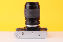 Load image into Gallery viewer, Olympus OM10 35mm Film SLR Camera with Sigma 70–210mm f/4–5.6 Telephoto Zoom Lens
