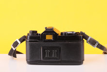 Load image into Gallery viewer, Chinon CE-4 35mm Film SLR Camera with Auto Chinon 50mm f/1.7 Lens
