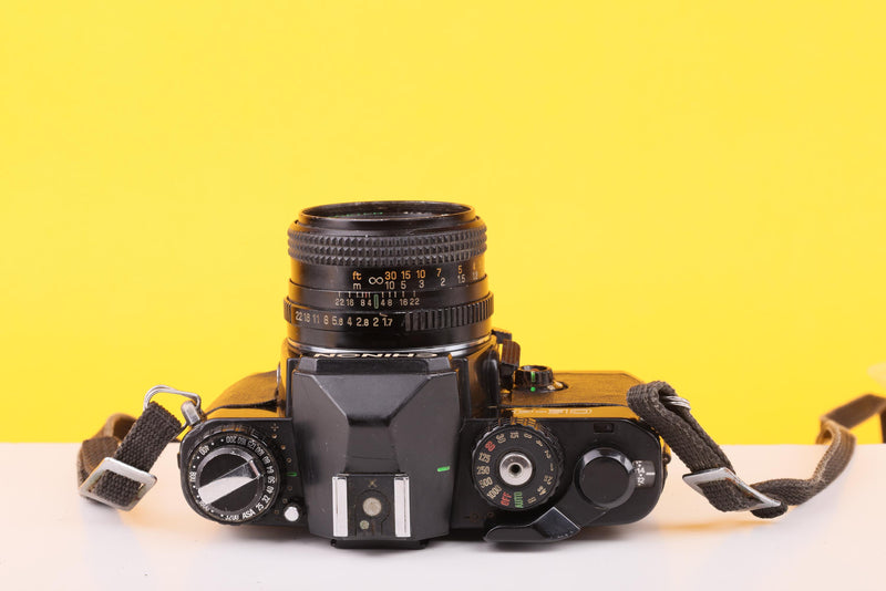Chinon CE-4 35mm Film SLR Camera with Auto Chinon 50mm f/1.7 Lens
