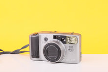 Load image into Gallery viewer, Minolta Riva Zoom 140EX Date 35mm Point And Shoot Film Camera with case
