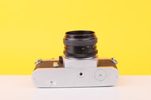 Load image into Gallery viewer, Chinon CS 35mm Film SLR Camera with Auto Flex 50mm f/2.8 Lens
