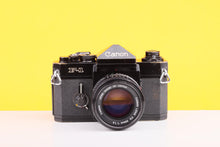 Load image into Gallery viewer, Canon F-1 35mm Film SLR Camera with Canon FD 50mm f/1.4 Lens

