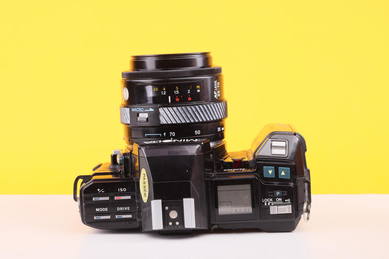 Minolta 7000 AF 35mm Film SLR Camera with Minolta AF 35–70mm f/4 Macro Zoom Lens