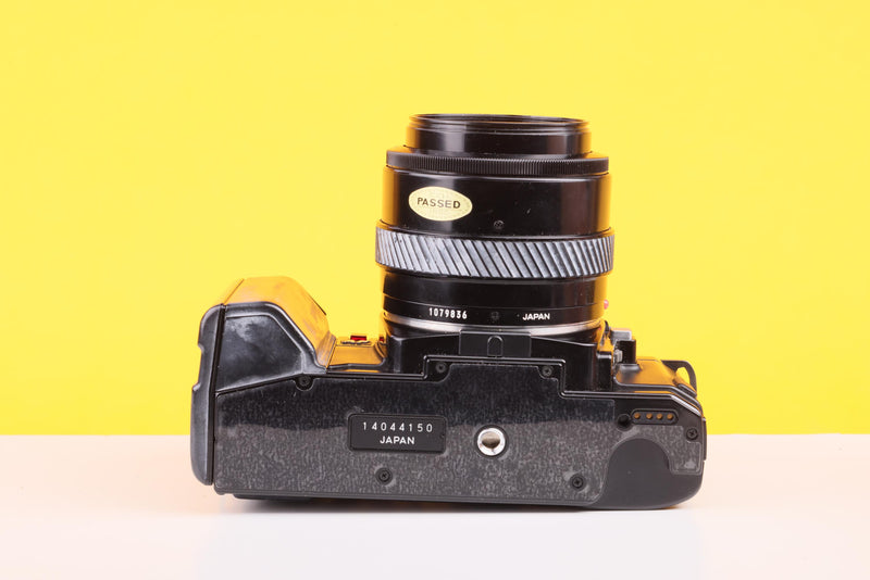 Minolta 7000 AF 35mm Film SLR Camera with Minolta AF 35–70mm f/4 Macro Zoom Lens
