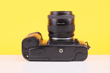 Load image into Gallery viewer, NIkon F-601 35mm SLR Film Camera with Nikkor 35-70mm f3.3-4.5 Lens
