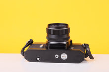 Load image into Gallery viewer, Asahi Pentax Spotmatic SP 35mm Film SLR Camera with Super-Takumar 55mm f/2 Lens
