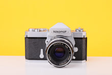 Load image into Gallery viewer, Nikon Nikomat FT 35mm Film SLR Camera with Nikkor-H Auto 50mm f/2 Lens
