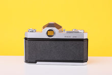 Load image into Gallery viewer, Nikon Nikomat FT 35mm Film SLR Camera with Nikkor-H Auto 50mm f/2 Lens

