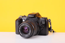 Load image into Gallery viewer, Canon EOS 3000 35mm Film SLR Camera with Canon EF 35–80mm f/4–5.6 Zoom Lens
