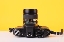 Load image into Gallery viewer, Yashica FX-1 Electro 35mm Film SLR Camera with Yashica ML Zoom 42–75mm f/3.5–4.5 Lens
