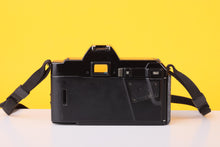Load image into Gallery viewer, Minolta 5000 AF 35mm Film SLR Camera with Minolta AF 50mm f/1.7 Lens
