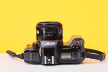Load image into Gallery viewer, Minolta 5000 AF 35mm Film SLR Camera with Minolta AF 50mm f/1.7 Lens
