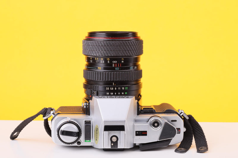 Minolta X-300 35mm Film SLR Camera with Tokina SD 28–70mm f/3.5–4.5 Zoom Lens