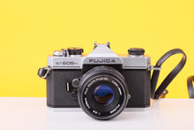 Load image into Gallery viewer, Fujica ST605N 35mm Film SLR Camera with Fujinon 55mm f/2.2 Lens

